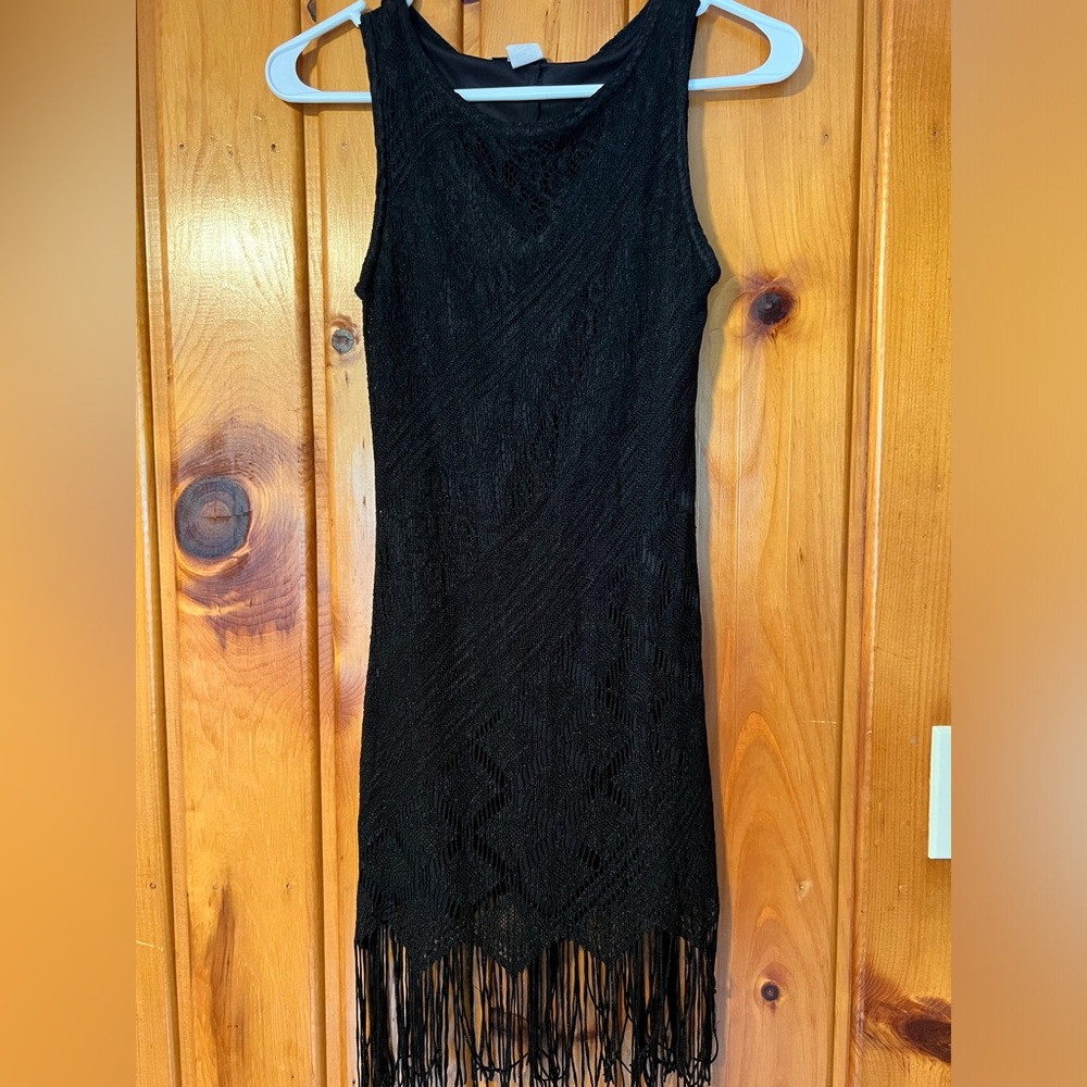 Super flattering fringe mini dress. Size Medium.